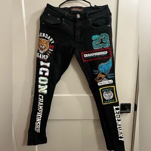 Legendary Black Skinny Jeans with Vibrant Patches